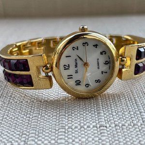 St. Marin Quartz Ladies Wristwatch Gold Tone Purple stone accent Watch